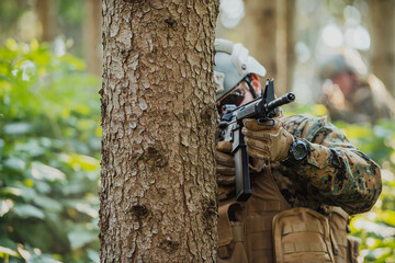 A modern warfare soldier on war duty in dense and dangerous forest areas. Dangerous military rescue...