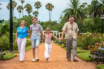Fototapeta premium happy family relaxing in the park