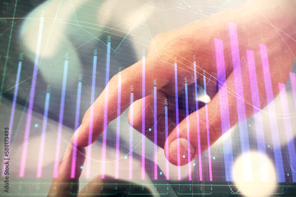 Poster multi exposure of man's hands holding and using a phone and financial chart drawing. market analysis