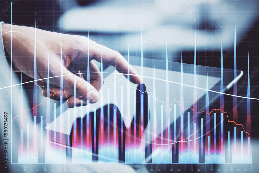 Poster multi exposure of man's hands holding and using a phone and financial chart drawing. market analysis