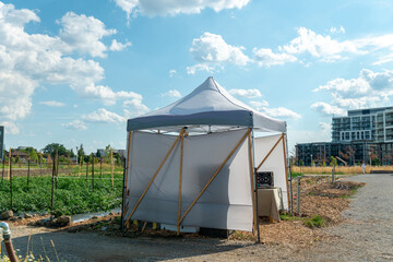 Self checkout or self service farm organic produce vegetable business model in Toronto city. Tent...
