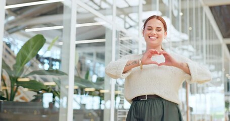 Business woman, walking or heart sign in modern office, coworking space or marketing company in customer focus or support. Portrait, happy smile or love hands gesture for happy designer with passion