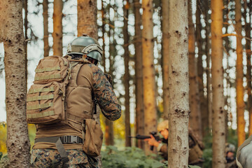 A modern warfare soldier on war duty in dense and dangerous forest areas. Dangerous military rescue...