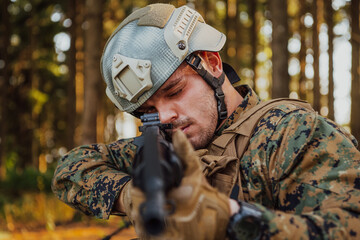 A modern warfare soldier on war duty in dense and dangerous forest areas. Dangerous military rescue...