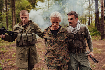 Fototapeta premium Terrorists was capture alive woman soldier and interrogation her on special tactics violent way