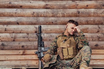 Upset soldier has psychological problems holding his head