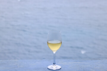 white wine tasting, chilled ice wine in a cold glass in summer