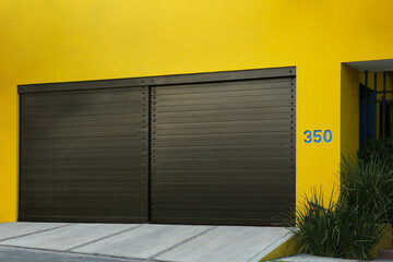 Closed gates of modern garage. Exterior design