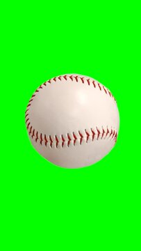 Spinning baseball loop with chroma key green background.  Vertical video