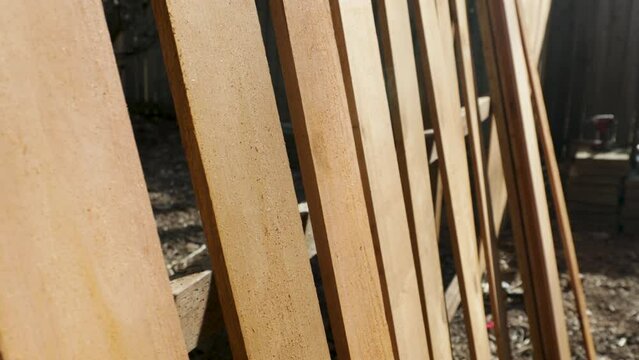 Scene of Fence Construction In Progress Being Built on a Sunny Day