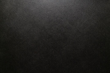 Black wooden background with studio light