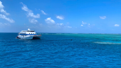 Ferry on the ocean near coral, filmed on The Great Barrier Reef, Sydney, Australia