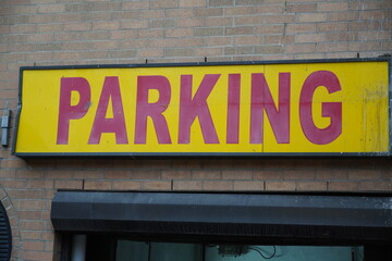 no parking sign on wall, parking garage entrance