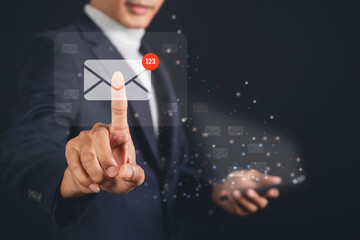 Business man touching email on virtual screen. electronic message. Email notification concept.