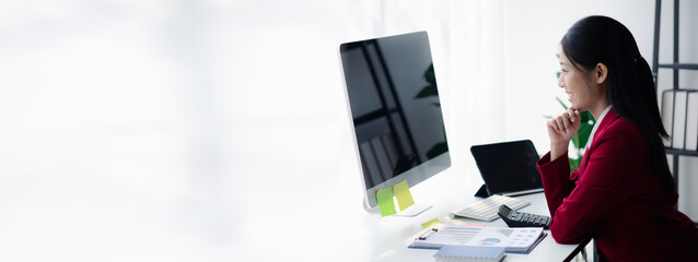 Businesswoman working in office, Asian female business owner conducts financial management, she set...