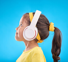 Music, headphones and listening with girl in studio for streaming, mobile radio and audio....