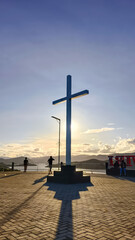 visit the hill of crosses at sunset