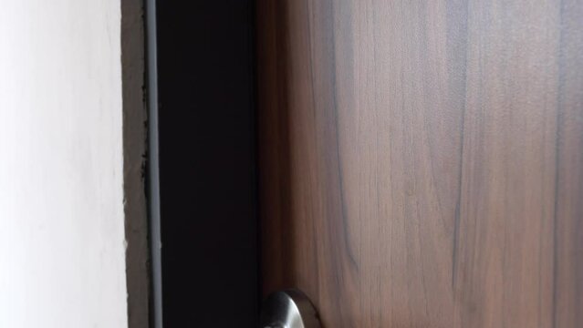 Close up on the doorknob.