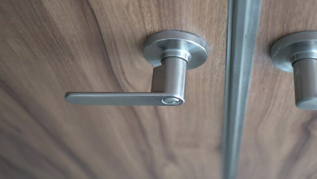 Close up on the doorknob.