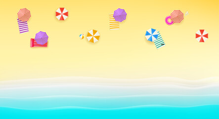 Bright sunny beach with color umbrellas and towels. Top view