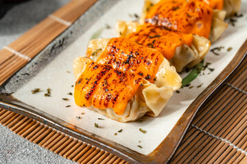 Grilled gyoza japanese dumplings foods with mentai sauce