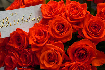 postcard , Internet banner  with a birthday greeting, with the inscription - happy birthday,  a bouquet of flowers with a note of congratulations