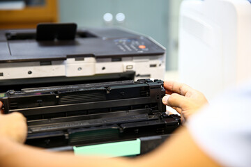 Technician hand open cover printer photocopier or photocopy to replace ink cartridges or fix paper...