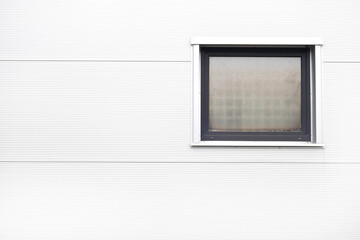 window on a white wall, minimalist architectural detail 