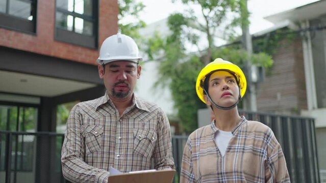 contractor and worker put on helmet for safety and talk with on construction building factory project,Concept of engineer civil team work,Leadership and business workflow of new building