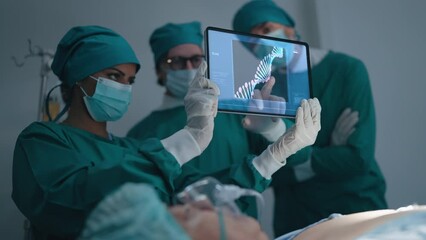 Professional medical team talking and discuss x-ray of patient with Rotating DNA chain - deoxyribonucleic acid at radiology department in hospital - Powered by Adobe