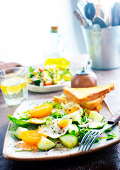 Avocado, vegetable and fried egg sandwich. Breakfast