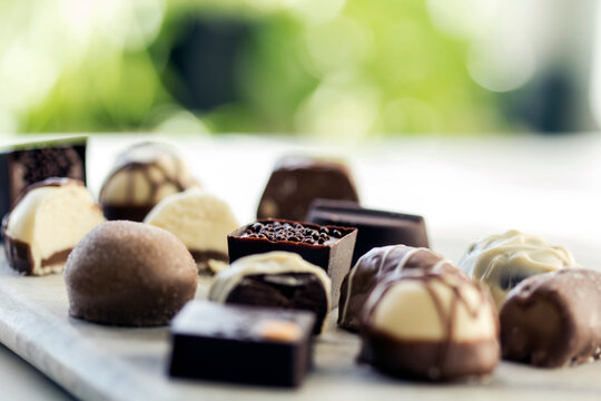 Close-up of various chocolates on table