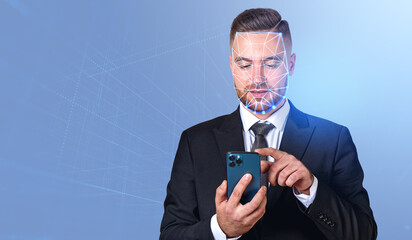 Businessman working with smartphone, facial recognition and auth