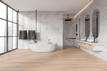 Stylish bathroom interior with bathtub, double sink and douche, panoramic window