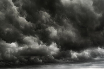 dark clouds make sky in black. Heavy rain thunderstorm. Pattern of clouds overcast predict tornado,...