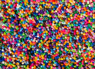 Fototapeta na wymiar Pieces of colorful plastic beads