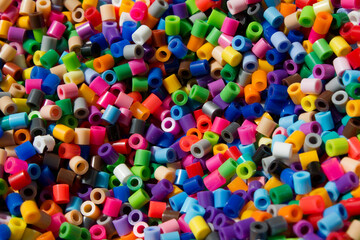 Fototapeta na wymiar Pieces of colorful plastic beads