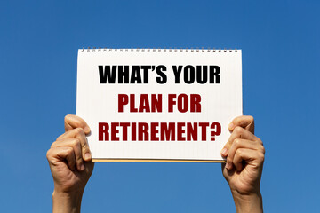 What's your plan for retirement text on notebook paper held by 2 hands with isolated blue sky background. This message can be used as business concept about planning for retirement.