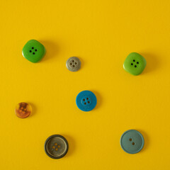 Spilled buttons of various colors and shapes