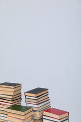 lots of books on a table on a white background in the library of science knowledge reading