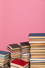 many books on a pink background in the library in the office of science knowledge reading