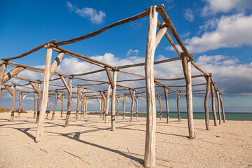 Empty beach and sea in early spring on a sunny day.