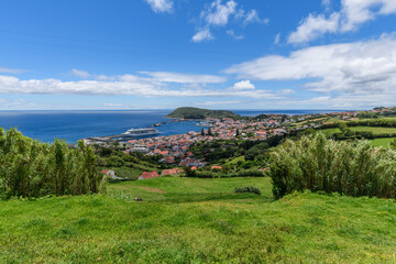 View over Horta, there is a cruise ship in the harbour / View over the city of Horta on the island of Faial, a cruise ship is in the port, Azores, Portugal. - 580276622