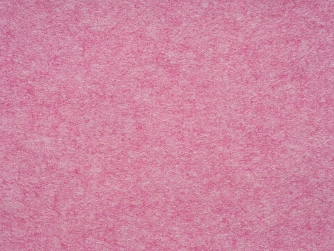 Sift pink, rose matt felt texture. Full frame matt backdrop wallpaper. Matt retro velvet pattern or vintage background in high resolution. Natural wool for text, lettering, patchworkor 3d art.