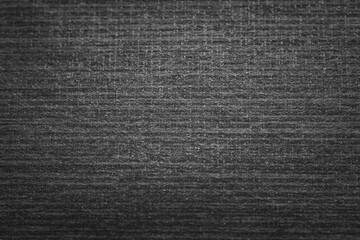 Woven dark gray texture close-up