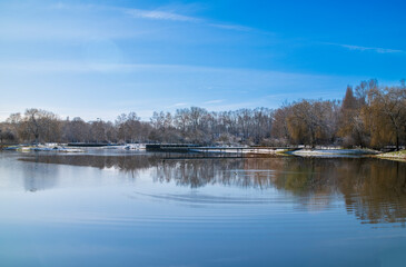 Fototapeta premium Winter view. Shooting a lake in winter. Snow landscapes. Gronau, NRW, Germany