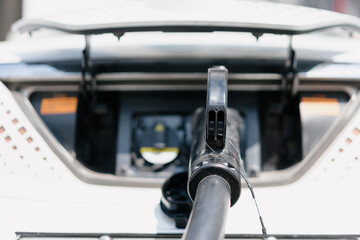 electric car charging in the station