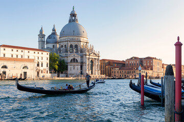Fototapeta na wymiar Venezia. Canal Grande con gondoliere e La Salute.