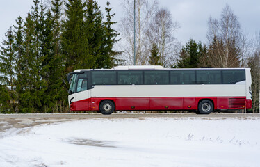 Fototapeta na wymiar An intercity passenger bus is driving on the highway