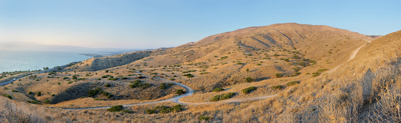 Shore of Lake Kinneret, the slopes of the Golan Heights in Israel